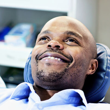 Man smiling on dentist chair